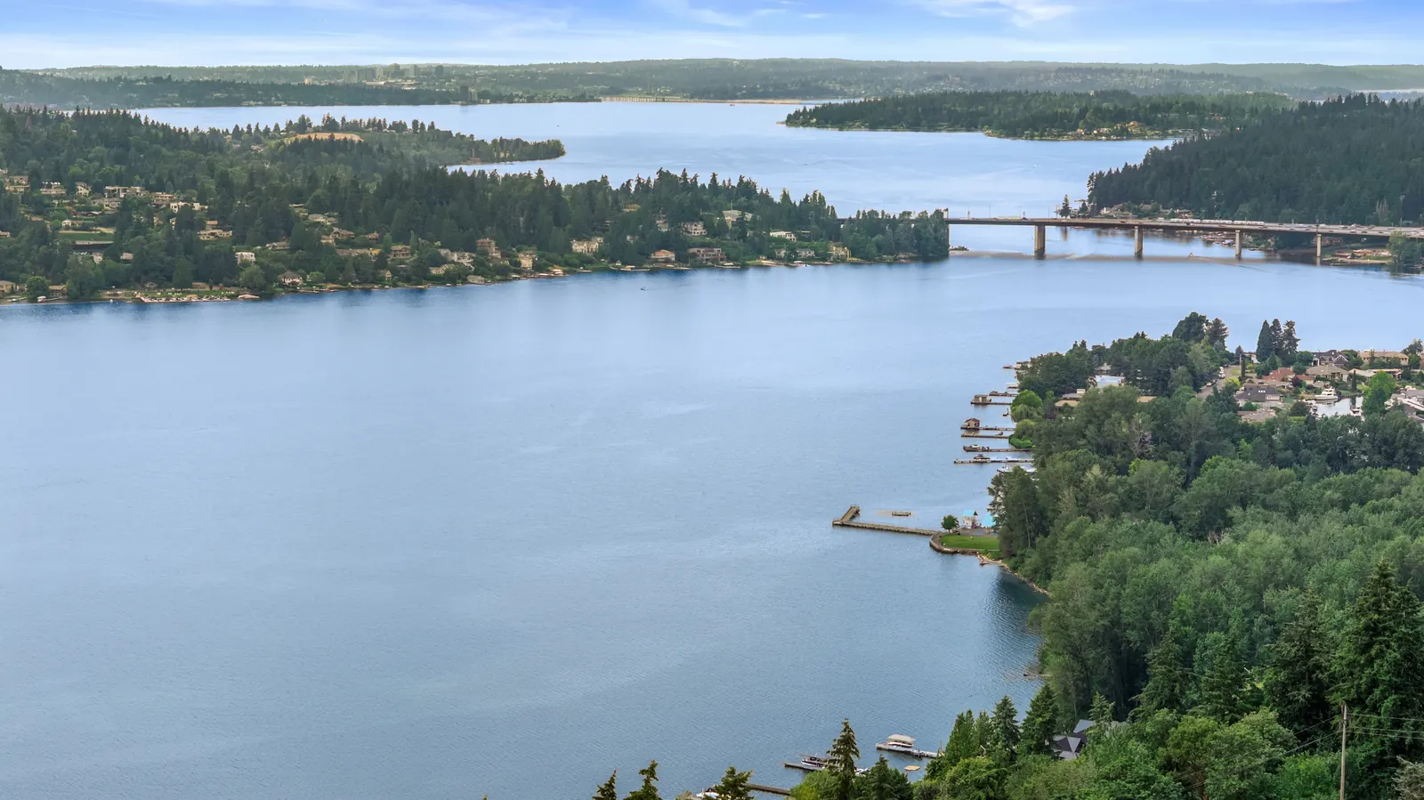 Drone view of Lake Washington from above a hillside neighborhood